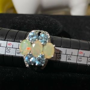 Sterling silver ring with faceted opal